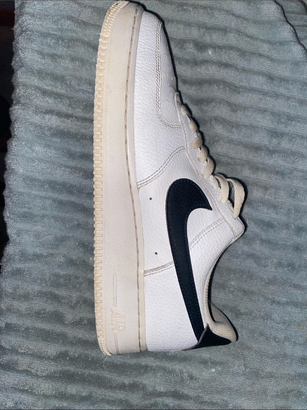 Nike White Low-Top Sneakers with Black Swoosh